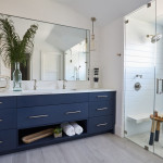 Navy blue bathroom vanity cabinet with shower white tile